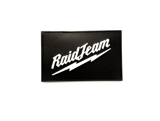 Black patch with 'RaidTeam' logo on a white background